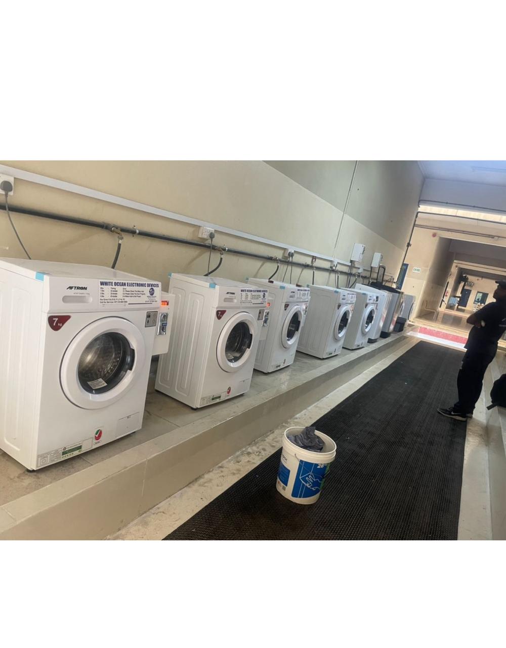 Commercial coin washer dryer installation UAE