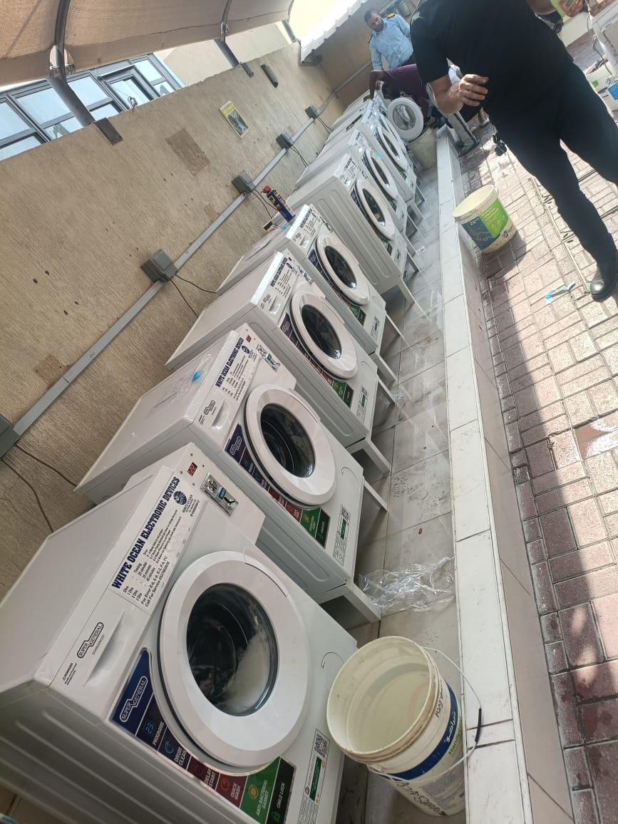 Labor camp laundry machines UAE installation